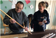 Don and Trish opening the pool cues.